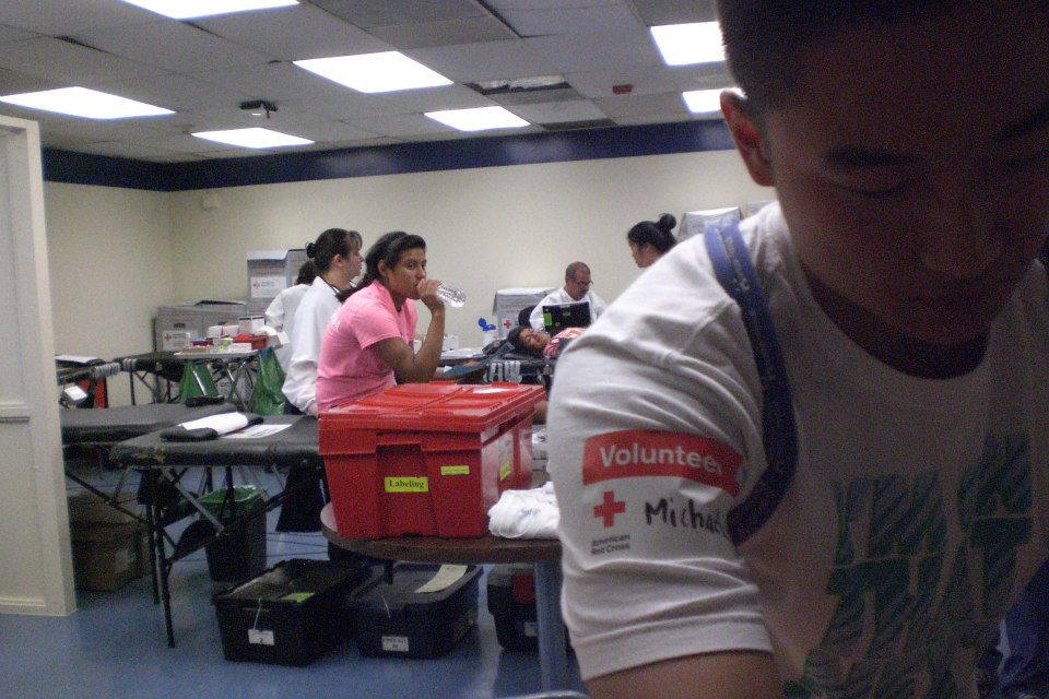 helping at blood drive